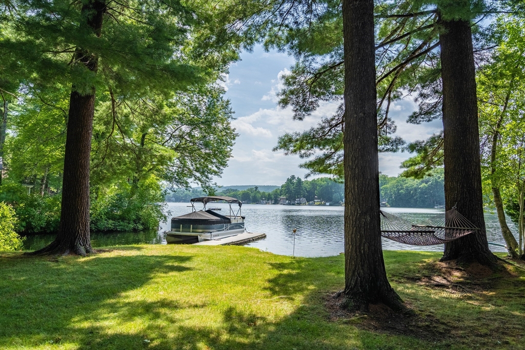 33 Mountain Brook Road Sturbridge, MA 01566 - Photo 5 of 41 a garden view with a lake view