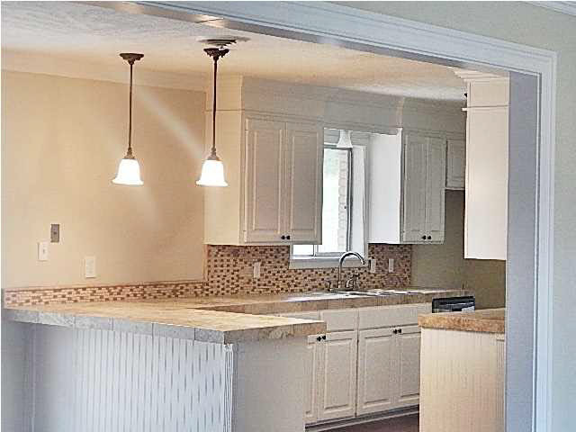 611 Dunton Road Clinton, MS 39056 - Photo 25 of 28 New kitchen with pendant lights