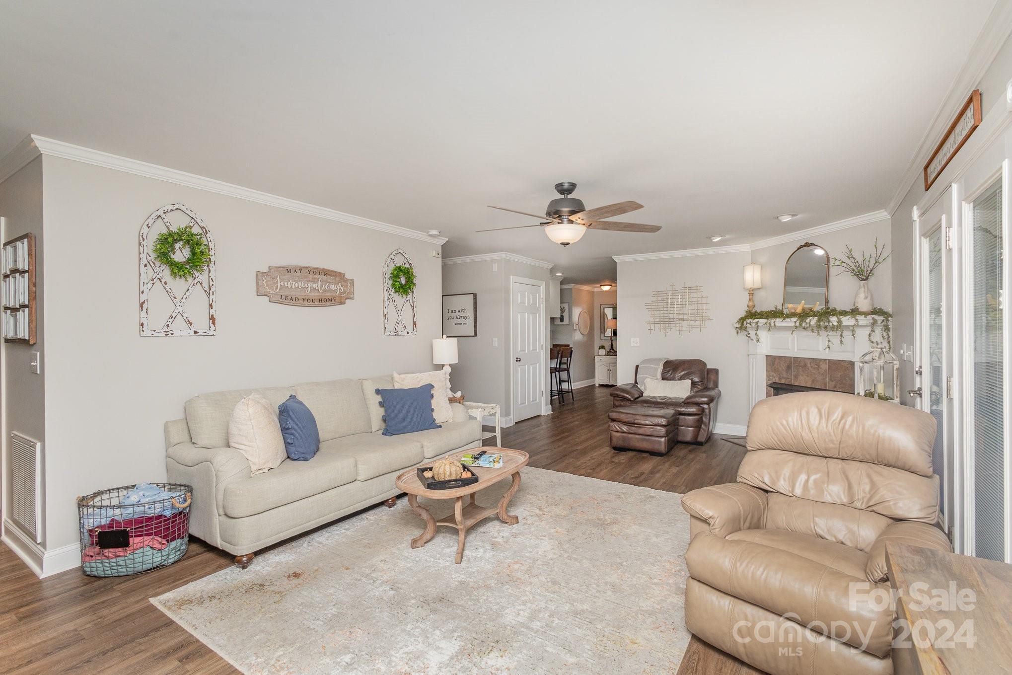13512 Five Point Road Locust, NC 28097 - Photo 11 of 31 a living room with furniture and wooden floor