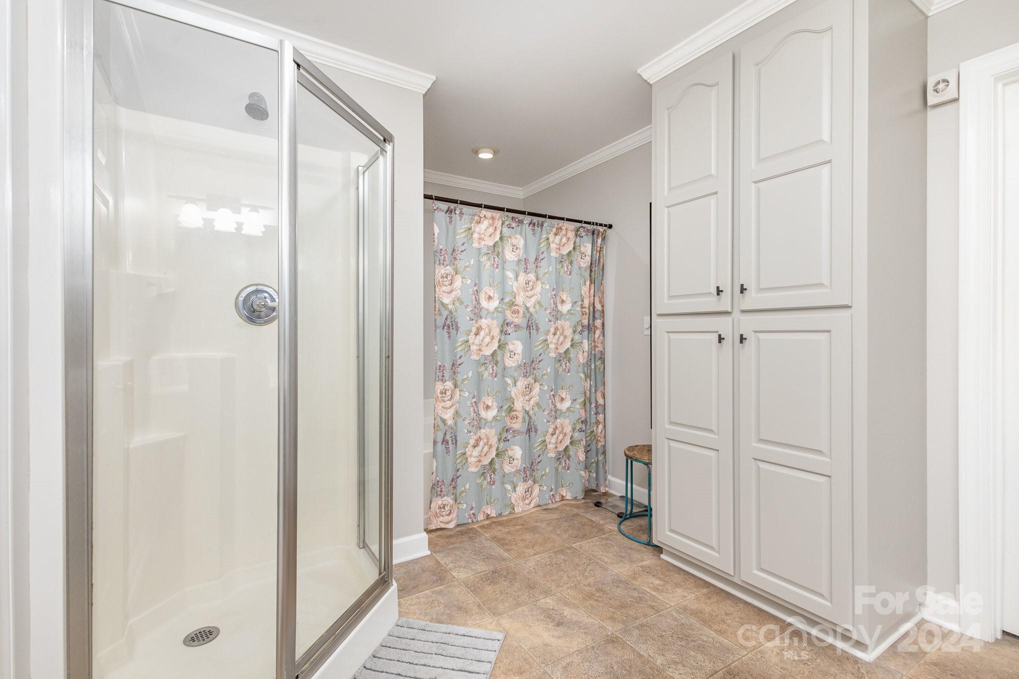 13512 Five Point Road Locust, NC 28097 - Photo 17 of 31 a view of a bathroom with shower