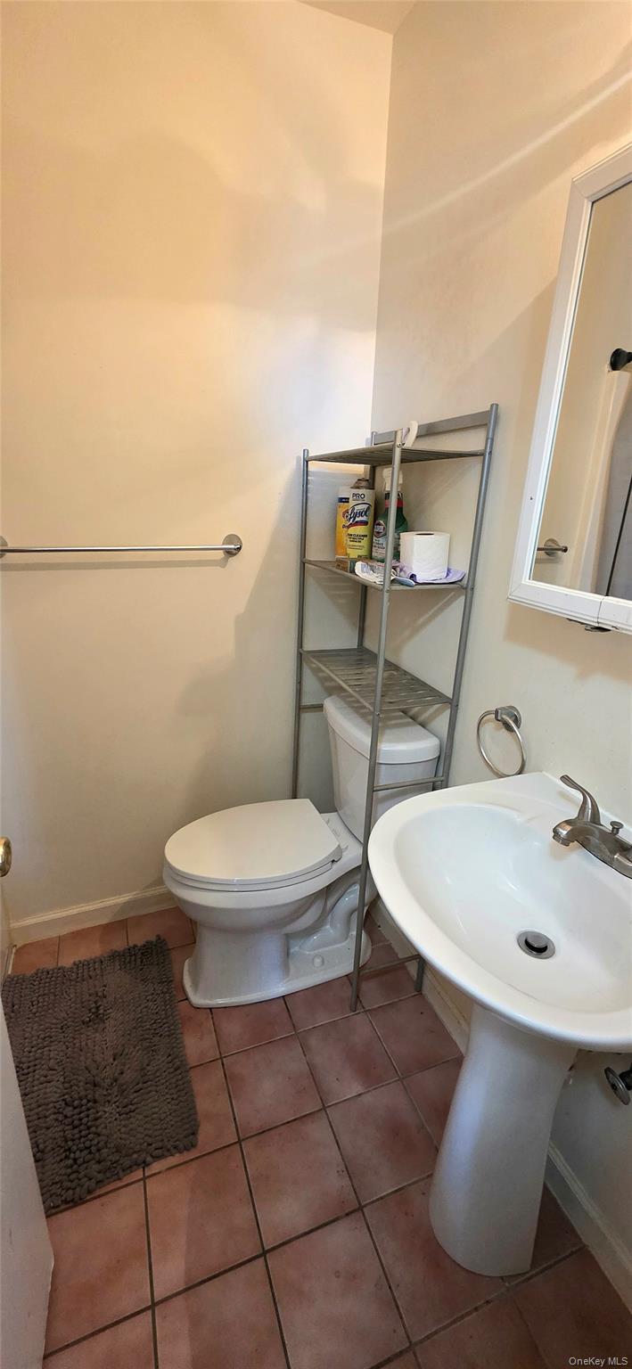 99 Evan Road Warwick, NY 10990 - Photo 16 of 20 a white toilet sitting next to a bathroom sink