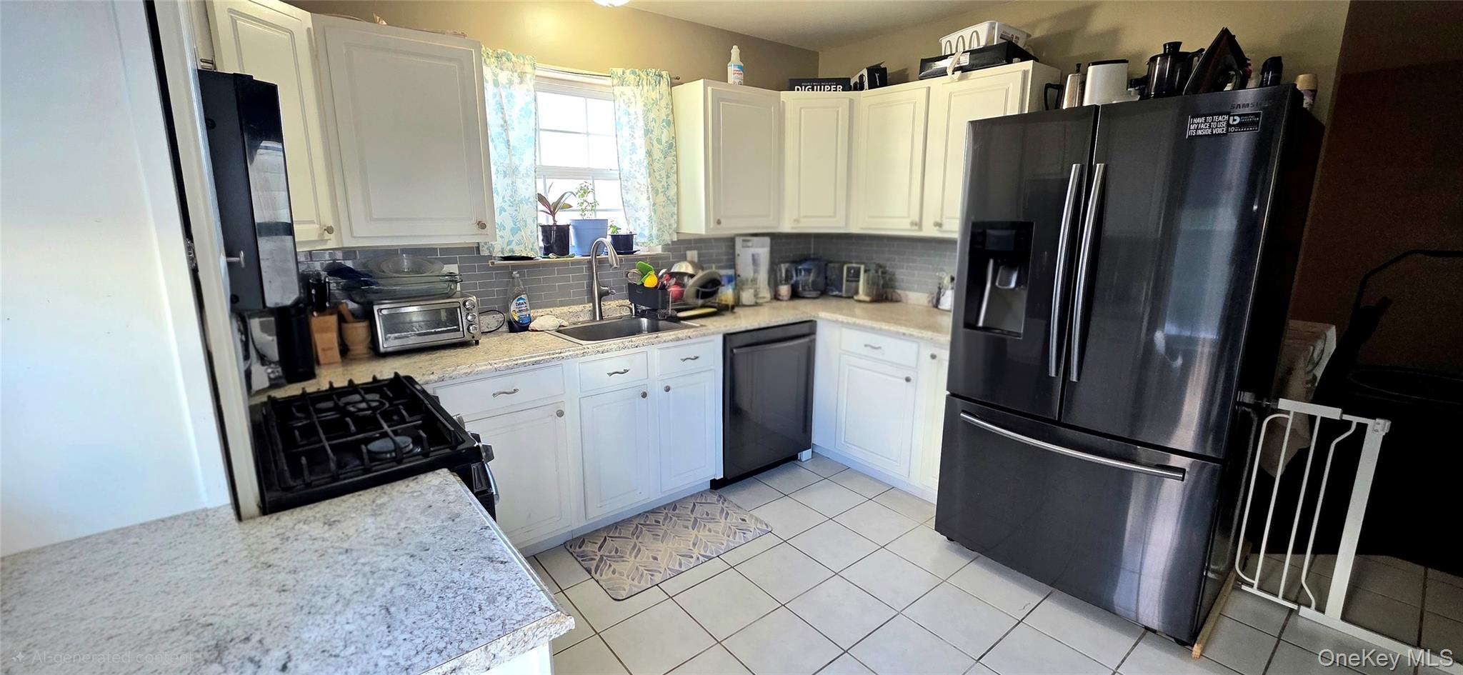 99 Evan Road Warwick, NY 10990 - Photo 7 of 20 a kitchen with a refrigerator stove and sink