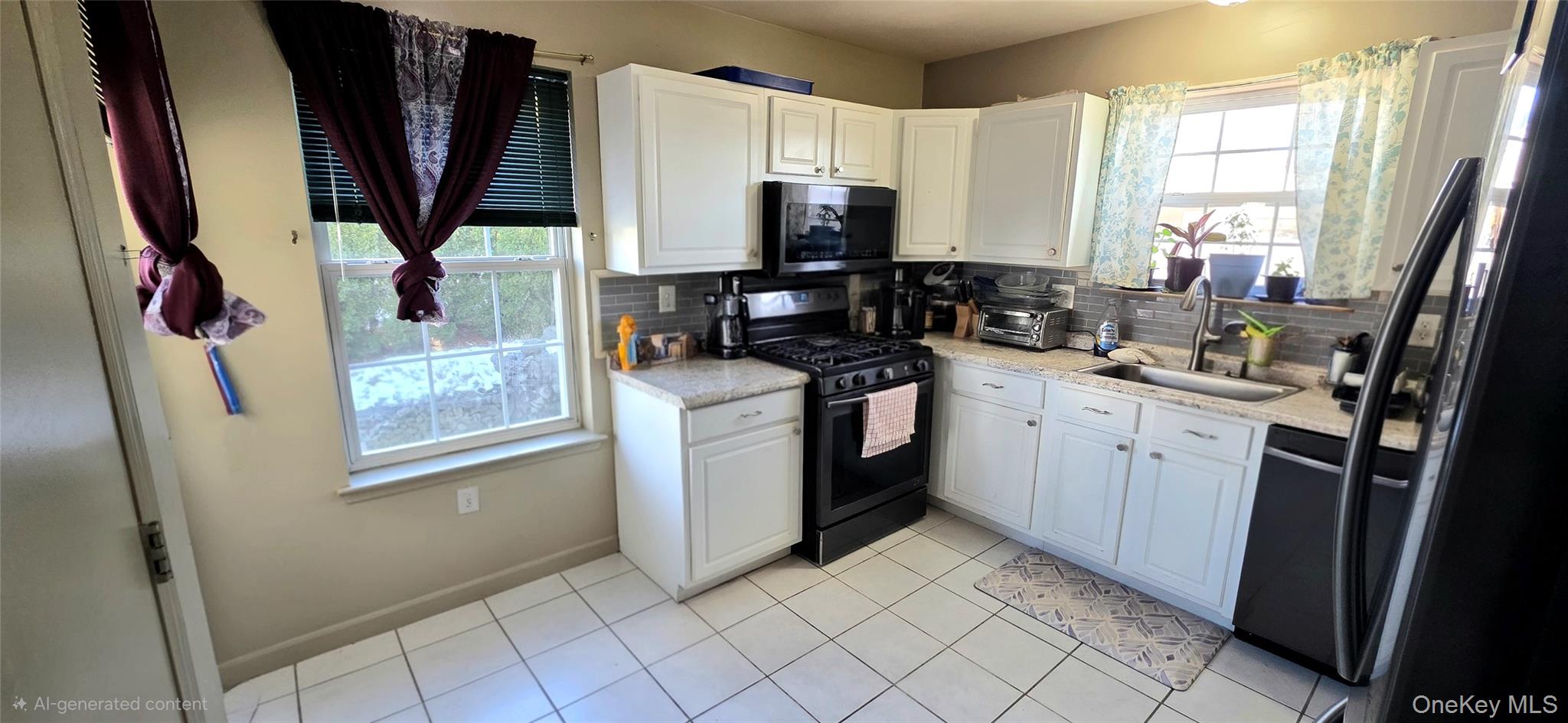 99 Evan Road Warwick, NY 10990 - Photo 8 of 20 a kitchen with stainless steel appliances a stove a sink and a refrigerator