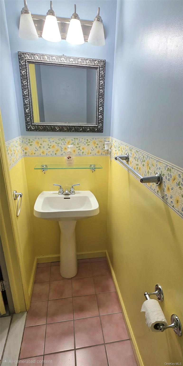 99 Evan Road Warwick, NY 10990 - Photo 9 of 20 a bathroom with a sink and a mirror