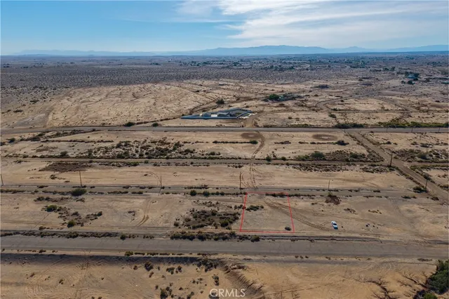 a view of beach and an ocean
