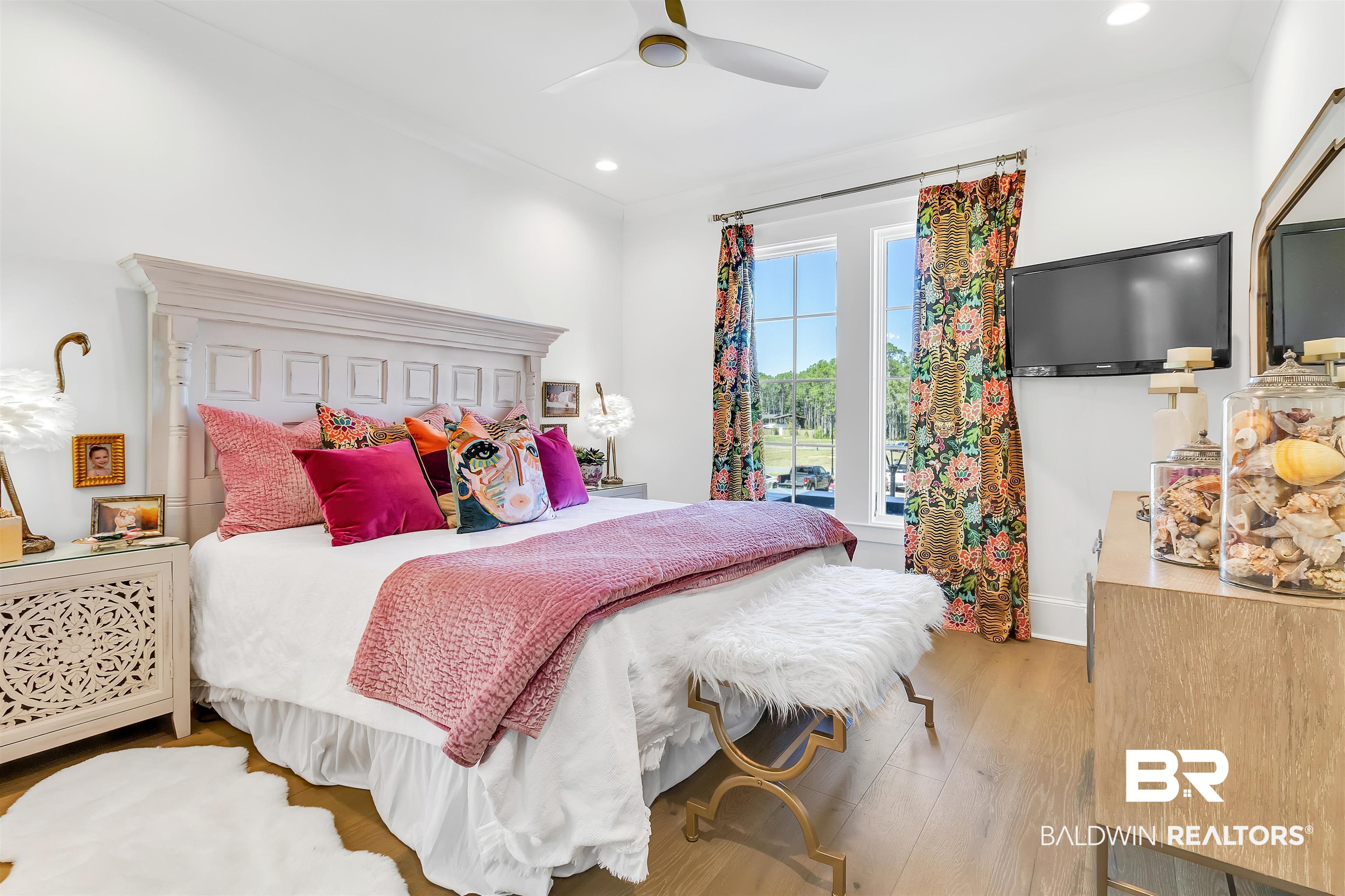 885 Inlet Circle Gulf Shores, AL 36542 - Photo 25 of 36 Bedroom with light hardwood / wood-style flooring and ceiling fan