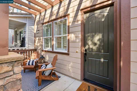a balcony with furniture and outdoor view