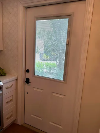 a view of walk in closet with a window