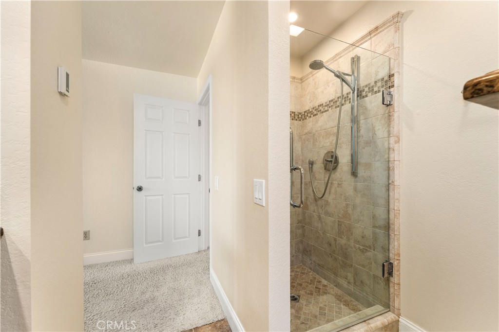 1106 Ridgecrest Circle Costa Mesa, CA 92627 - Photo 24 of 31 a bathroom with a shower