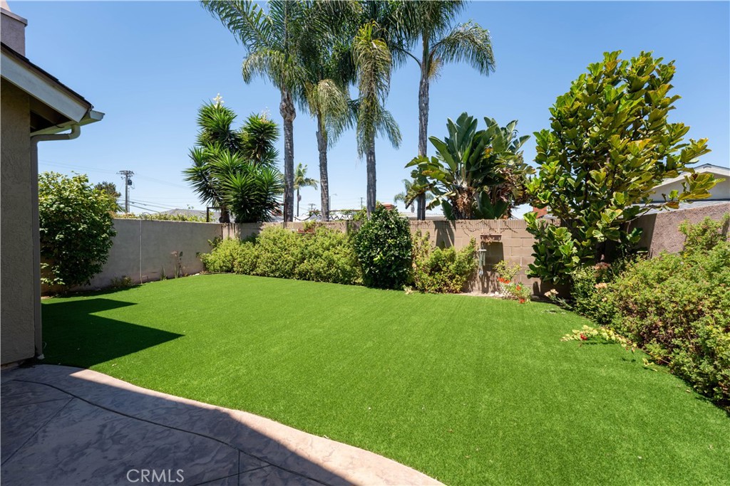 1106 Ridgecrest Circle Costa Mesa, CA 92627 - Photo 29 of 31 a view of a yard with palm trees