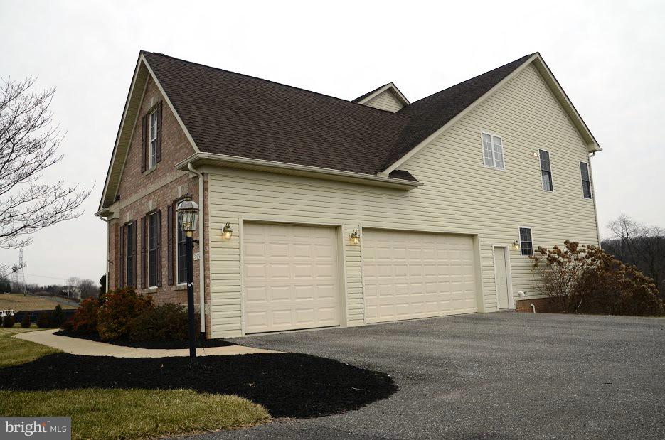 3109 Timber Ridge Circle White Hall, MD 21161 - Photo 3 of 49 Convenient three-car garage