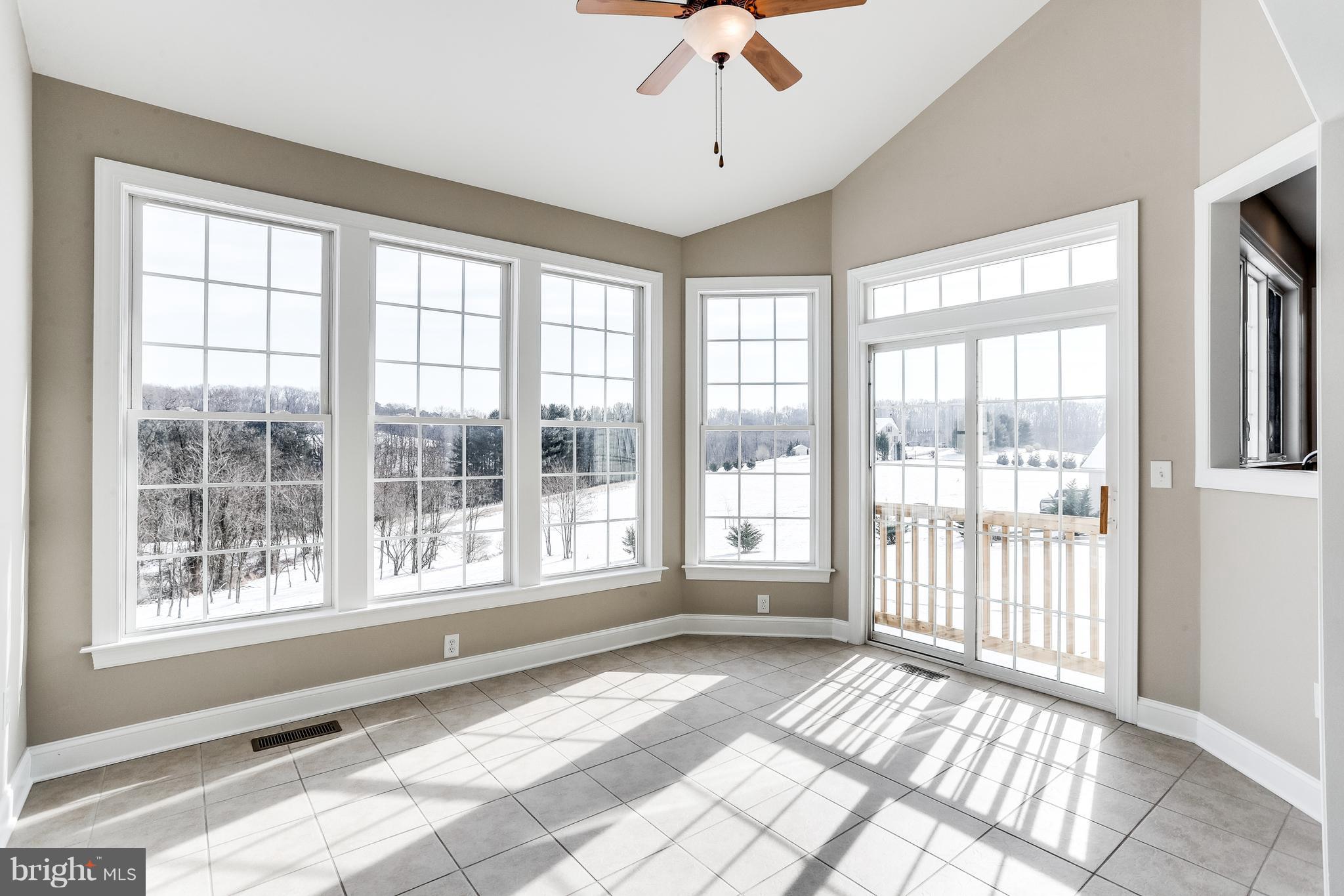 3109 Timber Ridge Circle White Hall, MD 21161 - Photo 24 of 49 Sunroom off kitchen and family room