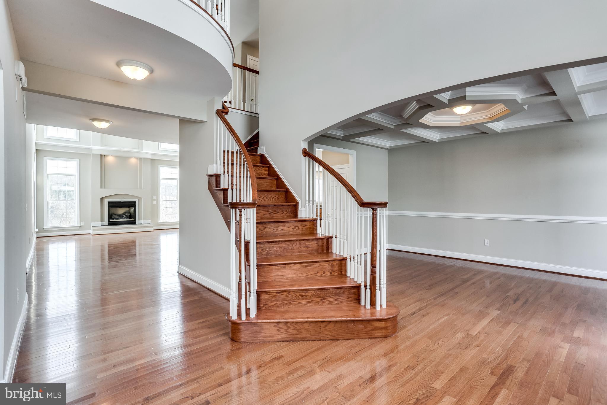3109 Timber Ridge Circle White Hall, MD 21161 - Photo 7 of 49 Dramatic foyer with curved staircase