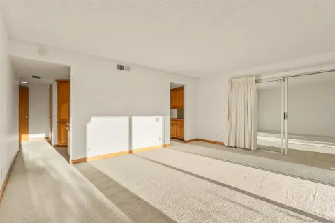 an aerial view of a house with a lake view