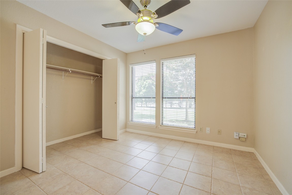 306 Corral Lane, Unit B Austin, TX 78745 - Photo 21 of 33 a view of an empty room with a window