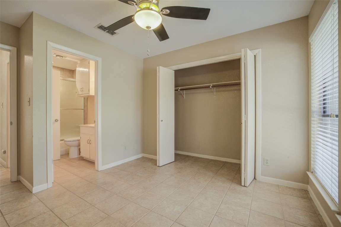 306 Corral Lane, Unit B Austin, TX 78745 - Photo 22 of 33 a view of an empty room with a window
