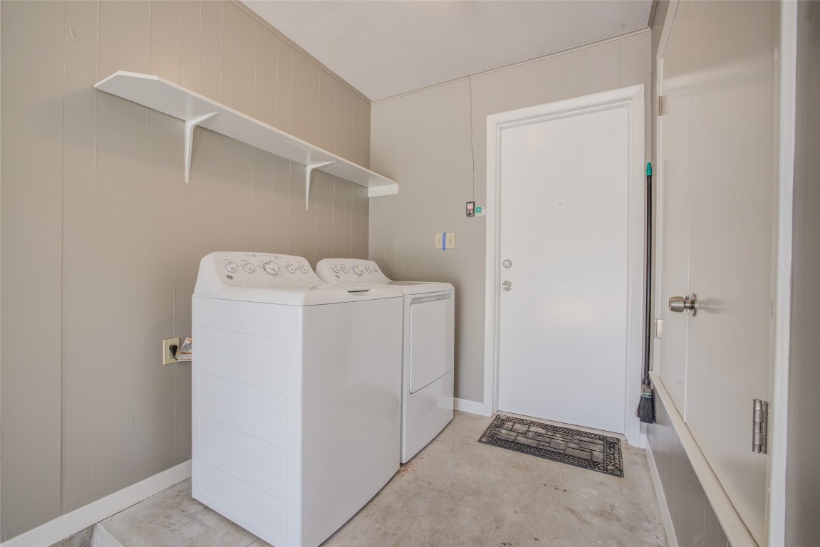 306 Corral Lane, Unit B Austin, TX 78745 - Photo 26 of 33 a utility room with dryer and washer