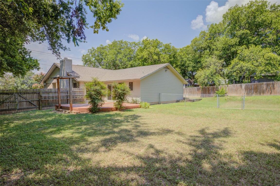 306 Corral Lane, Unit B Austin, TX 78745 - Photo 31 of 33 a house view with a garden space