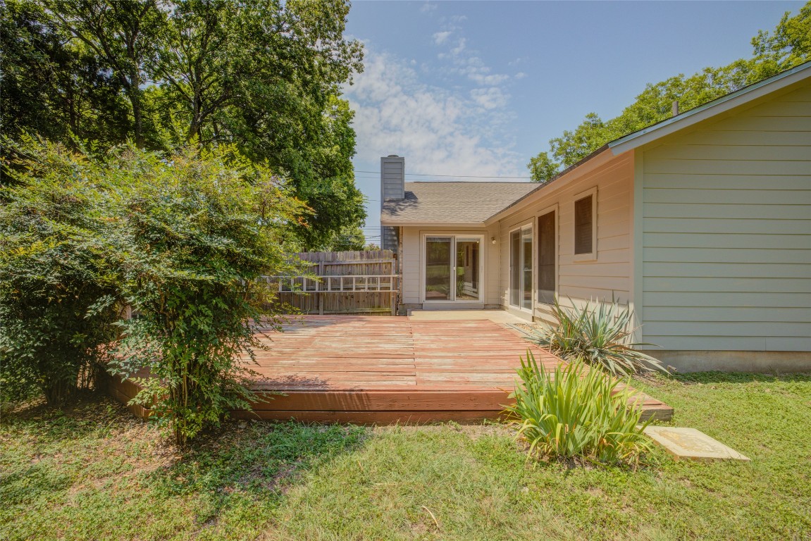 306 Corral Lane, Unit B Austin, TX 78745 - Photo 33 of 33 a front view of a house with garden