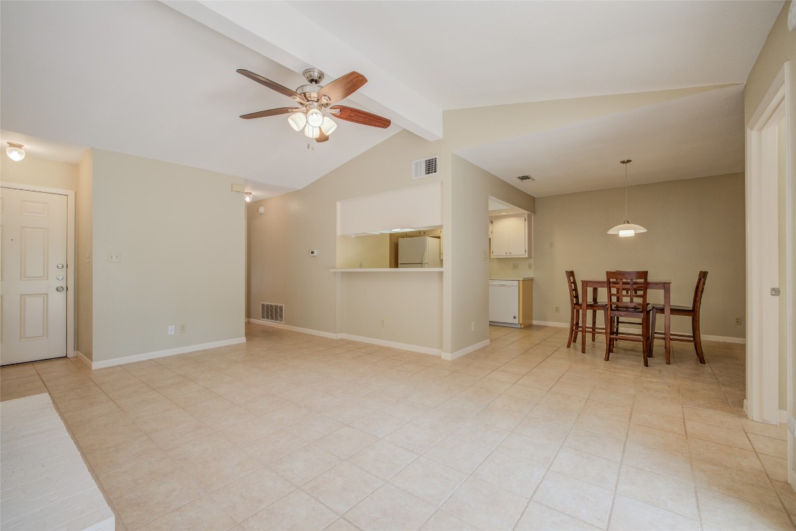 306 Corral Lane, Unit B Austin, TX 78745 - Photo 10 of 33 a view of an empty room with a window
