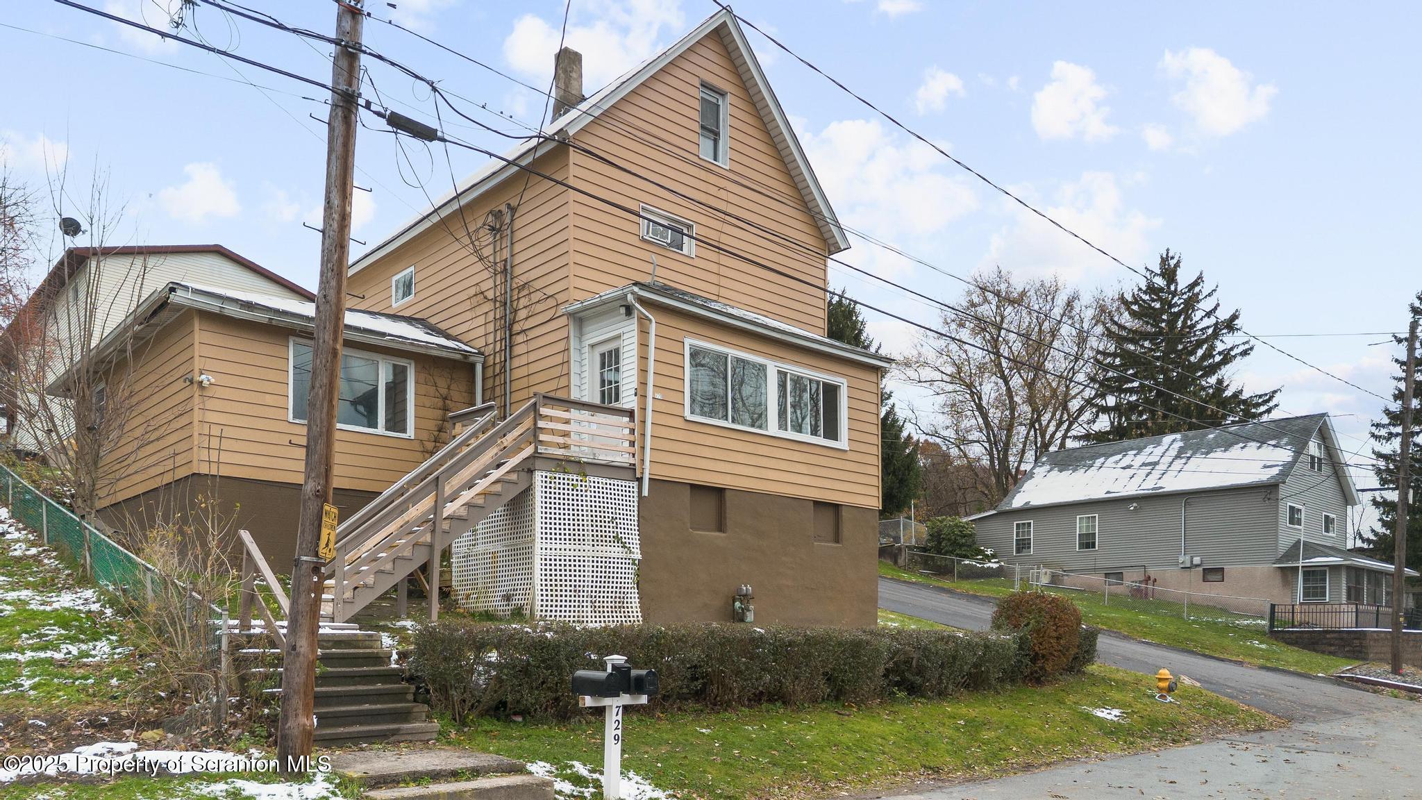 729 Moltke Avenue Scranton, PA 18505 - Photo 1 of 43 a front view of a house with garden