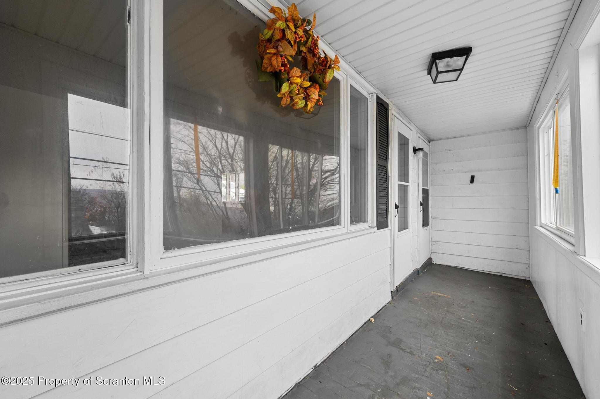 729 Moltke Avenue Scranton, PA 18505 - Photo 14 of 43 a view of a hallway with a window