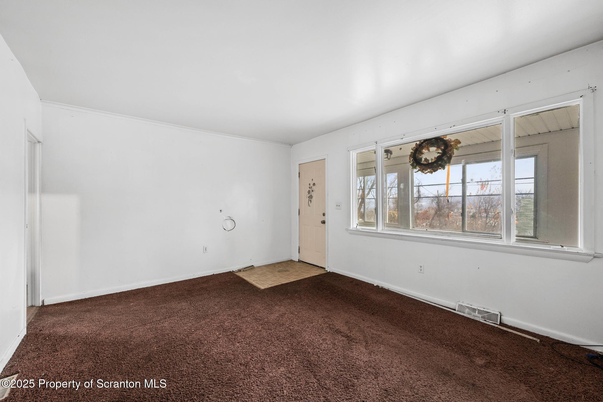 729 Moltke Avenue Scranton, PA 18505 - Photo 17 of 43 an empty room with a window