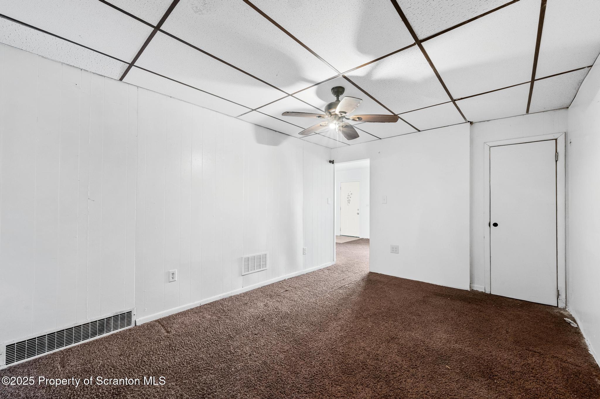 729 Moltke Avenue Scranton, PA 18505 - Photo 19 of 43 a view of a big room with wooden floor