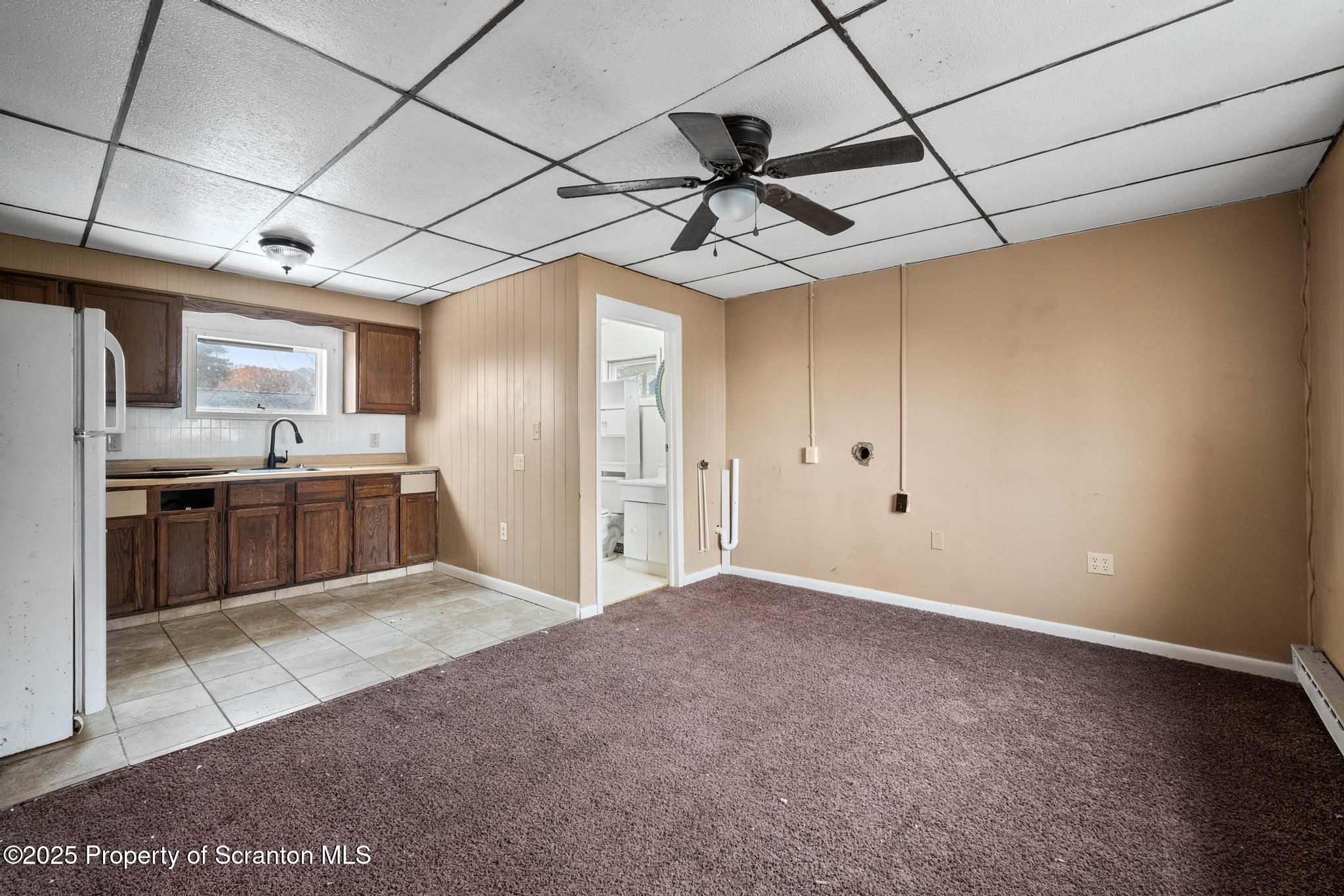 729 Moltke Avenue Scranton, PA 18505 - Photo 32 of 43 a view of a kitchen with a sink and a stove top oven
