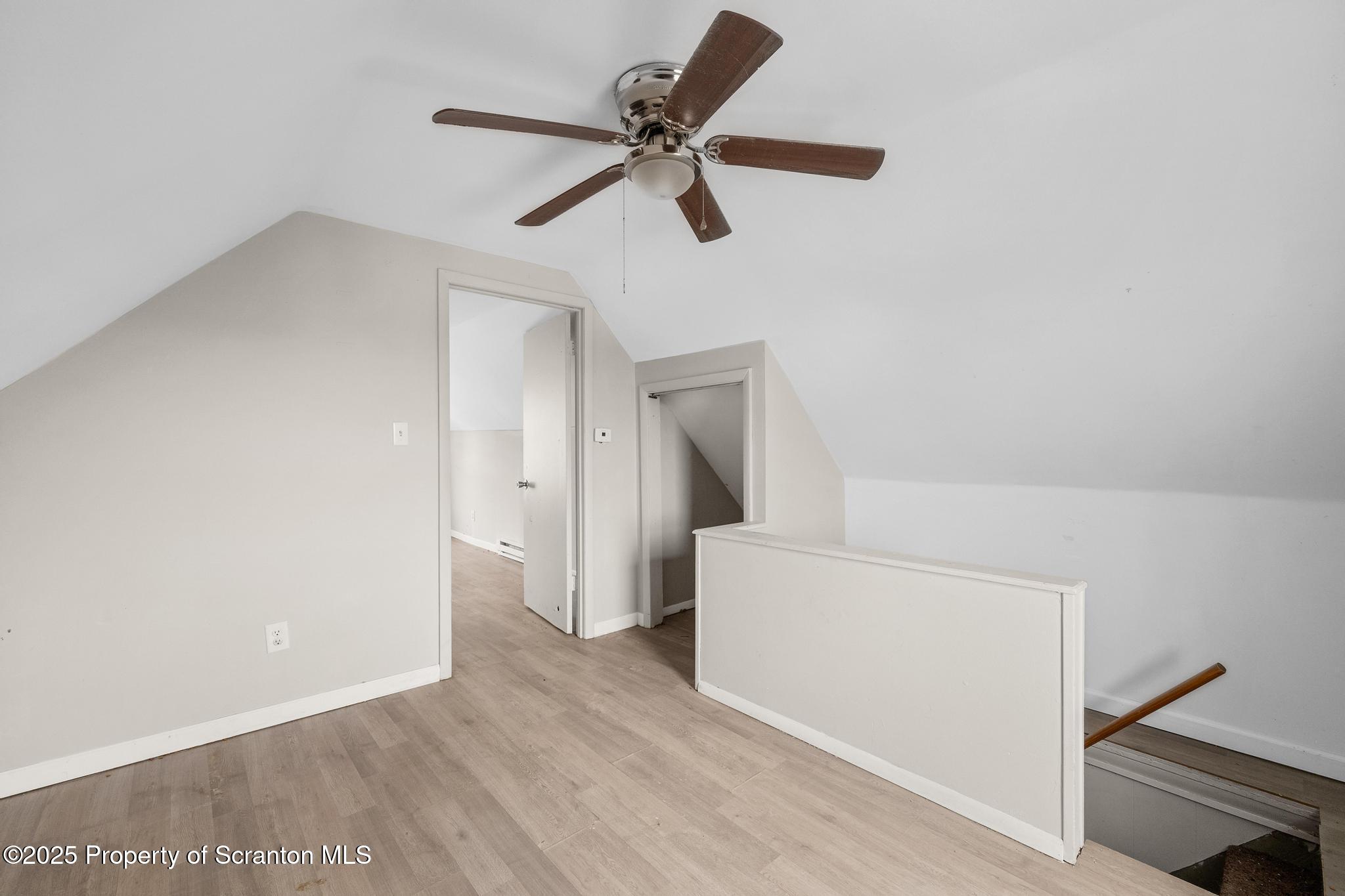 729 Moltke Avenue Scranton, PA 18505 - Photo 40 of 43 a view of empty room with wooden floor and ceiling fan