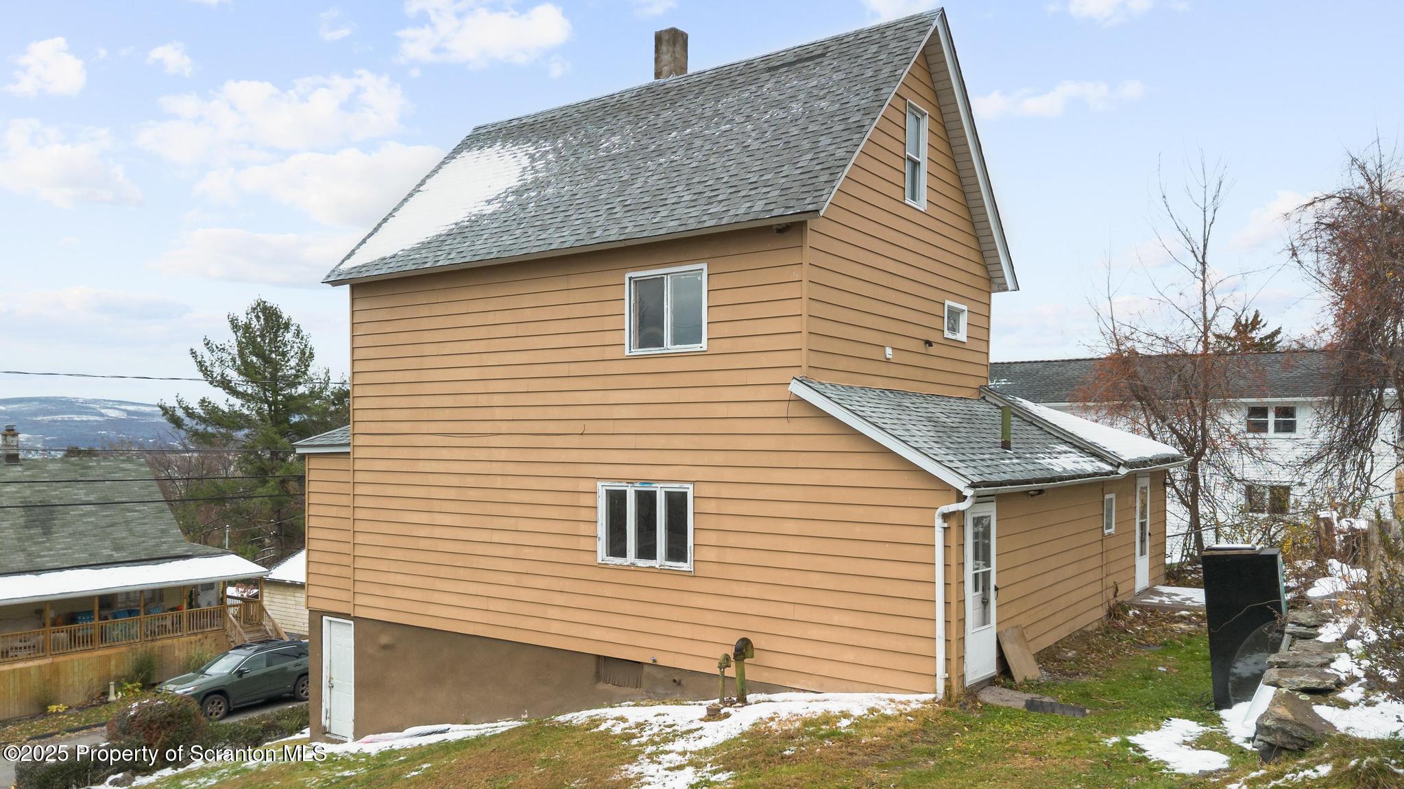 729 Moltke Avenue Scranton, PA 18505 - Photo 10 of 43 a view of a house with a yard