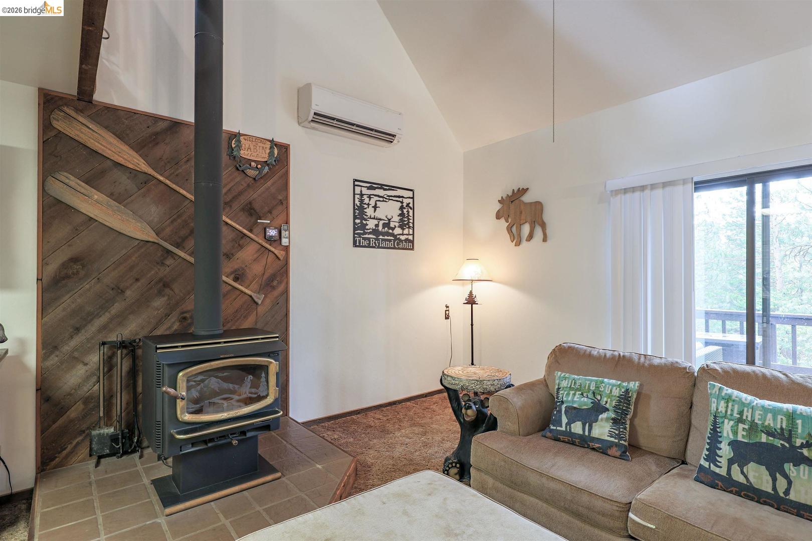 26600 Inyo Drive Cold Springs, CA 95335 - Photo 3 of 38 a living room with furniture a window and a rug