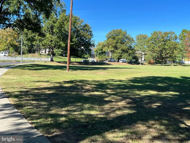 a view of a swimming pool with an ocean view