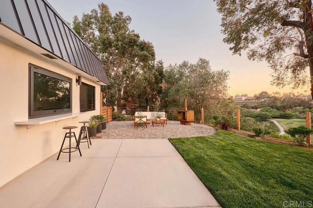 2025 Valley Road Oceanside, CA 92056 - Photo 20 of 31 a view of a patio with couches chairs and a fire pit