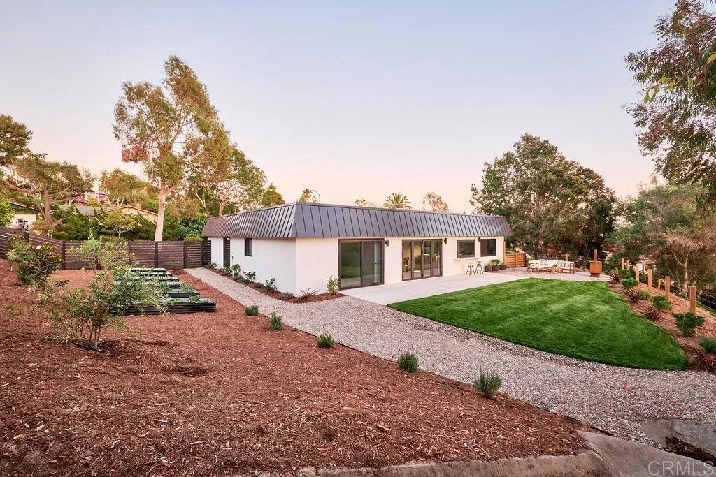 2025 Valley Road Oceanside, CA 92056 - Photo 25 of 31 a view of a house with a yard and large tree