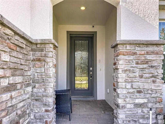 a view of front door of house with an outdoor space