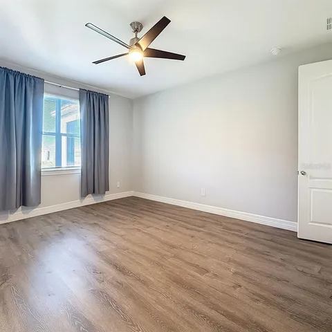 a lobby with furniture and window