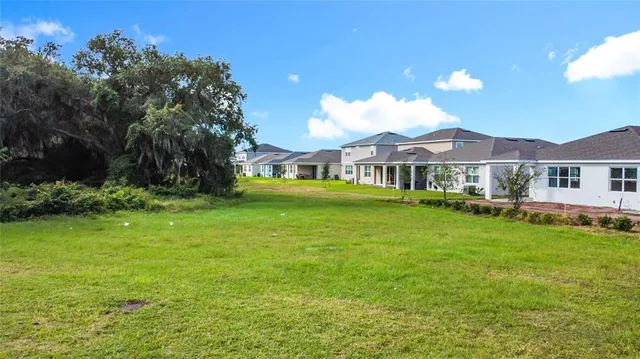 an aerial view of a house with a garden