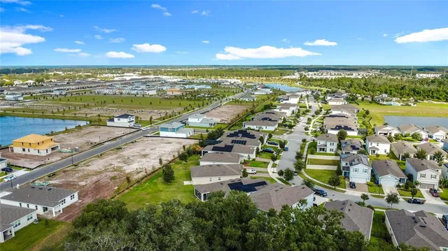 a view of a city with an ocean