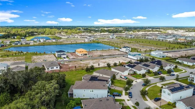 a wooden bench sitting in front of a house
