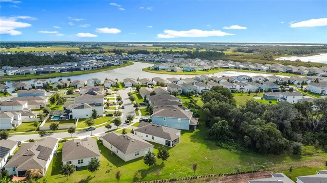 an aerial view of a house with a garden