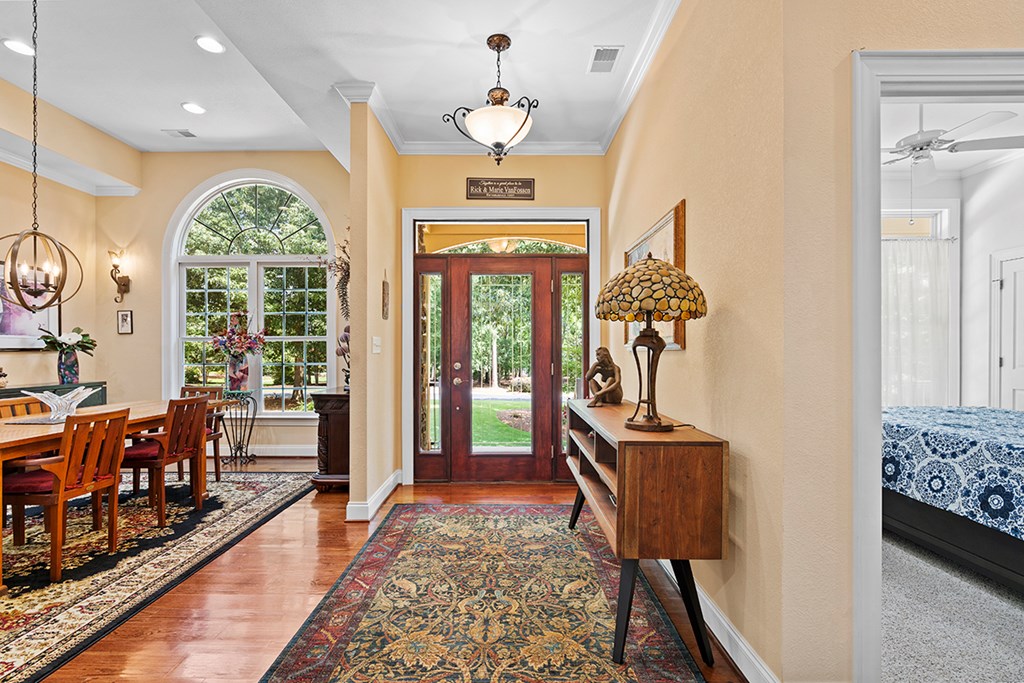 337 Compass Point Ninety Six, SC 29666 - Photo 4 of 43 a very nice looking room with a large window and chandelier