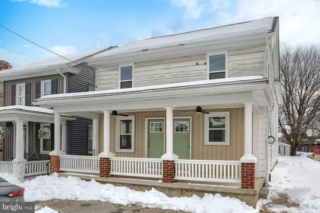 a view of a house with a deck