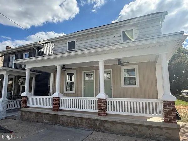 a view of a house with a deck