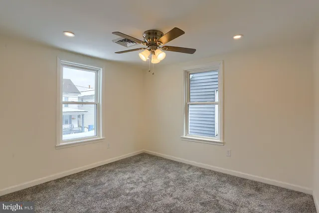 a building that has a tree on the side of it