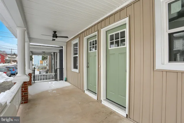 a kitchen with a sink dishwasher a stove and a refrigerator