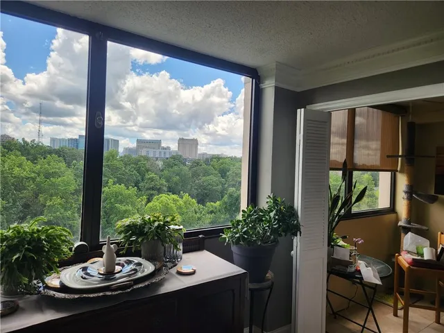 a house with a table and chairs in patio
