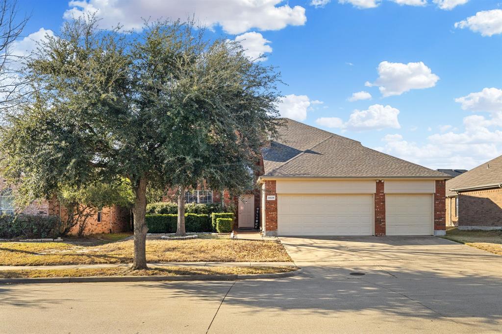 4029 Bridge Water Road Heartland, TX 75126 - Photo 7 of 39 a house with trees in front of it