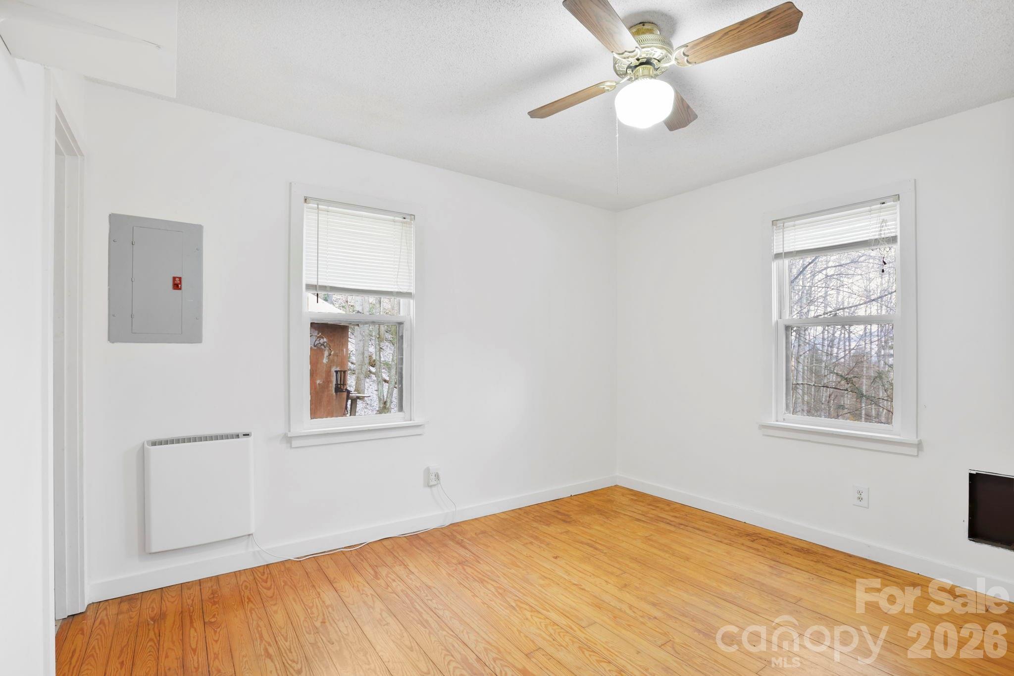 186 Greentree Lane Canton, NC 28716 - Photo 14 of 32 a view of an empty room with a window