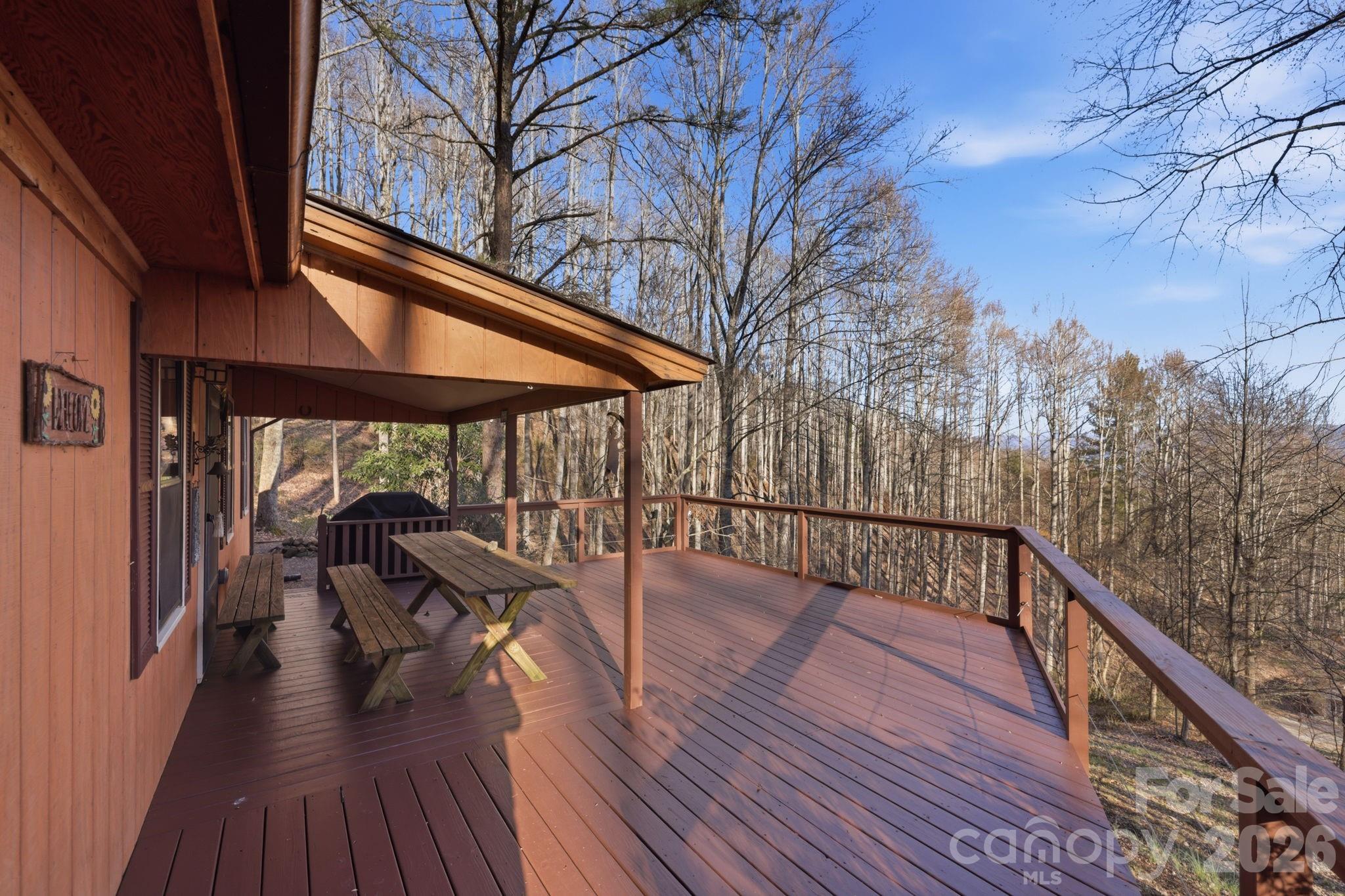 186 Greentree Lane Canton, NC 28716 - Photo 2 of 32 a view of balcony with furniture and wooden floor